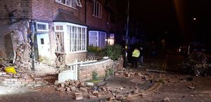 The car crashed into the house in Sutton Coldfield on Sunday night. Photo: @TechRescueWMFS