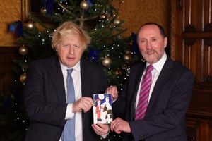Boris Johnson and Eddie Hughes with Holly's card
