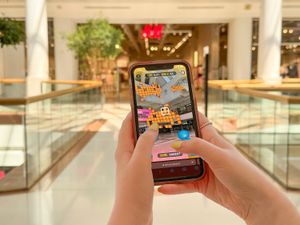 Augmented reality game ‘Merry Hill Invaders’, which is part of QRious Quest, is shown.
