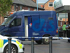 Supporting image for story: Shots fired in bank raid