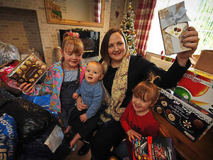 Supporting image for story: WATCH: Family's flood appeal donations fill up home