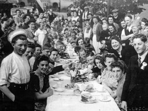 PICTURE FROM THE ARCHIVE: Hednesford VE Day May 1945 on Wrights Avenue as locals got together for a huge celebration, with tablecloth-covered trestle tables and plenty of treats on offer. It is thought this picture was taken a few days after the end of the war in Europe, probably on a weekend. 