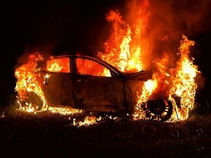 Supporting image for story: Car destroyed by 'deliberate' fire in field near Market Drayton
