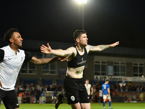 Matty Stenson scores the winner to guide Telford to the play-off final (Pic: Kieren Griffin Photography)