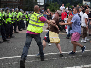 Supporting image for story: Police officer hospitalised and 20 arrested at EDL demo in Birmingham