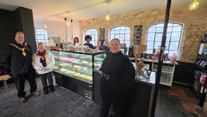 The Mayor and Mayoress of Dudley, Councillor Peter Lee and his wife Gloria, with business owner Zoe Konopka and the team at the Red Cone Coffee House at Wordsley