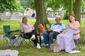 Relaxing at Telford Town Park with Daisy the dog were Emma and Andy Jefferies, and Andrea Molloy.