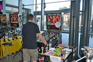 Wayne shows record-breaking moves on the pinball machine