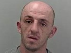 Supporting image for story: 'Predatory' burglar caught after ramming police car in high speed chase  