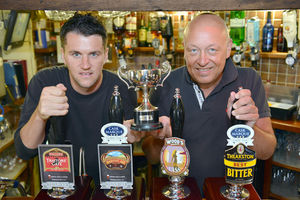 Darren, right, and his partner Stuart Wassall have suffered homophobic abuse