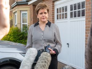 Nicola Sturgeon outside her house