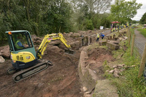 Waterway Recovery Group canal camp participants at work rebuilding Meretown Lock, Newport.