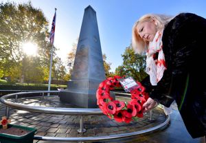 Rose Cook-Monk lays a wreath in Dudley