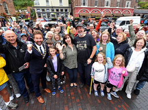 Chris and Marianne Fisher surrounded by supporters in Ironbridge.