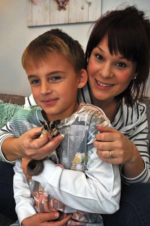 Faye and Bradley with a sugar glider