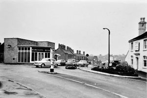 Dawley, possibly during the late 1960s. Those modern flats visible in the distance in King Street, just beyond the Royal cinema, were built in 1964. This is the junction of King Street and High Street (which goes off to the left) in Dawley, with the Lord Hill pub on the right and Barclays Bank just left of centre. Image from the collection of Ray Farlow.