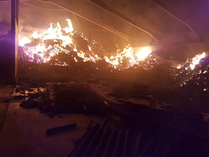 Supporting image for story: 175 tonnes of hay and grass destroyed in barn fire