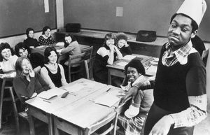 Lenny Henry doing his Tommy Cooper impression to his classmates at The Bluecoat School, Dudley, in 1974