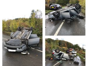 Supporting image for story: Fire crews deal with crash after car rolls onto roof and driver escapes unhurt