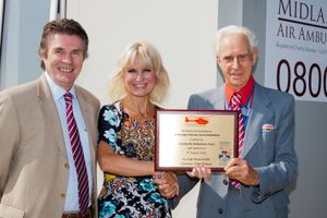 Robert Bertram, CEO County Air Ambulance, Hanna Sebright, CEO Midlands Air Ambulance, with Hugh Meynell MBE at the opening of the upgraded Strensham airbase in 2012.