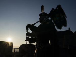 Supporting image for story: Lone piper plays at Edinburgh Castle to mark 80th anniversary of VJ Day
