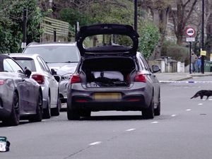 A car at the scene of a hit-and-run incident at the junction of Regent’s Park Road and Primrose Hill in north London