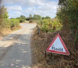 A 'flood' sign that is left permanently by the junction to the proposed lagoon. Picture: Chris Naylor