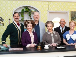 John Cleese on set with the cast of Fawlty Towers: The Play