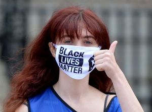 Many protestors wore face masks in solidarity with BLM