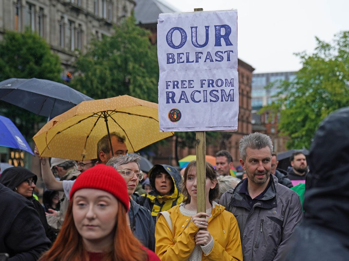 Northern Ireland one petrol bomb away from a racist murder, Belfast rally hears