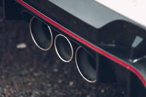 The impressive and noisy triple pipe exhaust