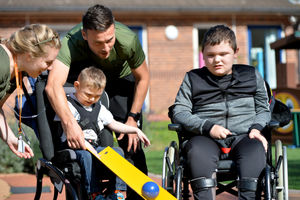 Mat Sadler plays bowls with Thomas