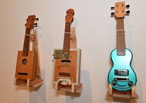 Creative items like homemade guitars were available to see