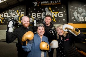 Left to right, Jack Clements from McPhillips with Joe Lockley of Bright Star Boxing Sonia Roberts SCF trustee and Val Hardy of McPhillips