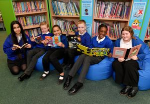 Pics at Burnt Tree Primary School, Olbury for School Focus feature.Catching up on some reading in the library.