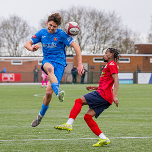 More action from Lichfield with Finlay Shorrock leaping high. Pic: Jim Wall