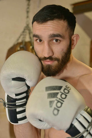 Aroon Fiaz poses for the cameras at his family's Wellington Boxing Academy base on Mill Lane.