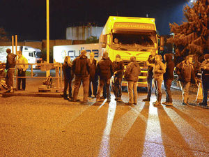 Supporting image for story: Farmers blockade dairy giant's Shropshire plant in new milk protest