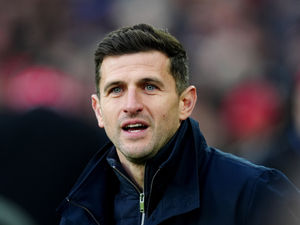 Portsmouth boss John Mousinho has been linked with the vacant job at The Hawthorns. Pic: PA