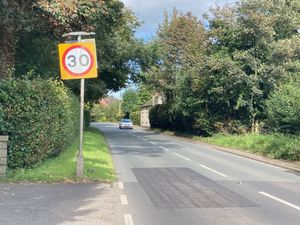 The 30 miles per hour sign coming from Ellesmere
