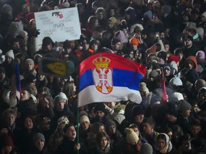 Supporting image for story: Tens of thousands protest outside Serbian TV HQ after student badly injured