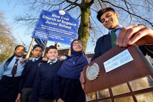 Blue Coat pupils Dami Babatolu, 10, Asim Malik, 11, Charlie Staples, 10, and Amal Usman, 10, with Namir Chowdhury