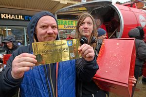 Rafal Bartoski with his golden ticket from his box