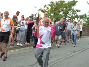 Charity marathon runner Dana Power, more commonly seen in a dragon costume