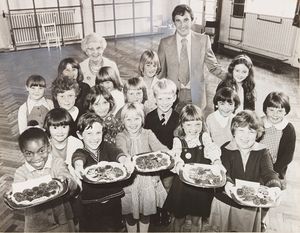 July 1977: 'Children at Warstones Infants School were presented with their silver jubilee crowns today, and seen with some of the pupils are Councillor Mrs Violet Fletcher, chairman of the school management committee, and Mr Roger Sanders, parents' representative on the committee.'