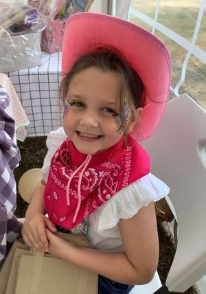 A very happy cowgirl celebrating Hillfest!