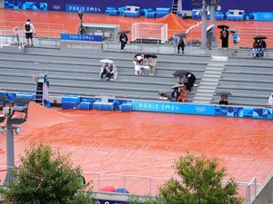 Supporting image for story: The Paris rain continues at Olympics as cyclists struggle and sports delayed