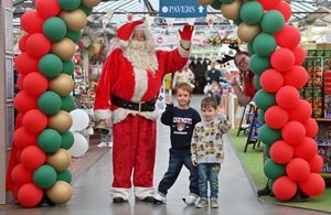 Nuala, 6, and Mac O'Sullivan, 3, with Santa