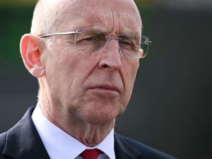 Defence Secretary John Healey looking stern