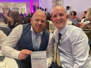 Supporting image for story: Police officers acknowledged for youth service award